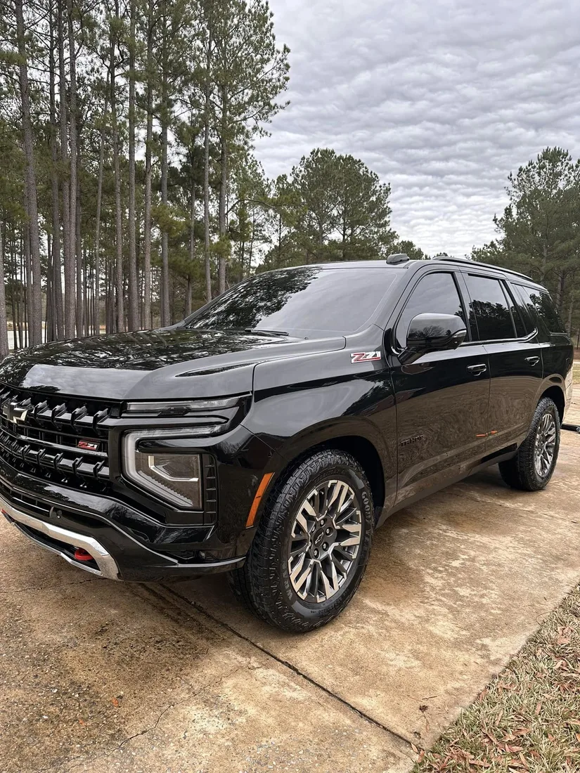 Glossy black SUV with a fresh ceramic coating