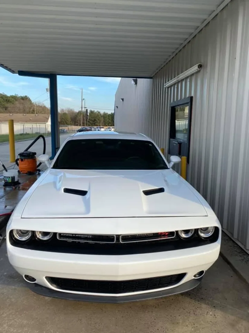 White Dodge Challenger after a full exterior detail